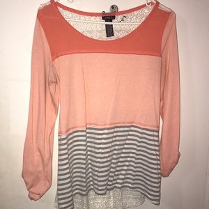 Rue21 long or mid-rise shirt.